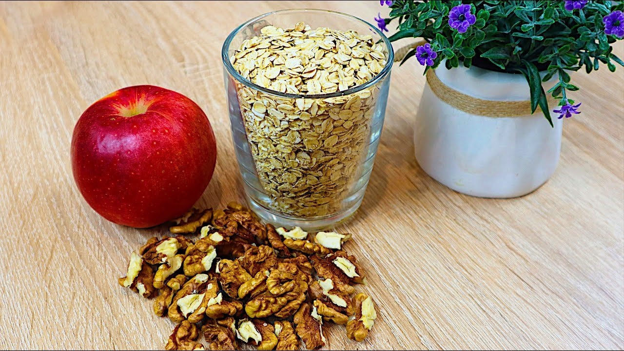 Hearty Oat, Apple and Walnut Breakfast Muffins — Hearty oatmeal muffins loaded with grated apples, walnuts, lemon zest and cinnam