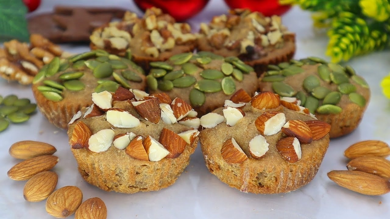 Vegane Buchweizen-Nuss-Muffins (Glutenfrei, Eifrei) — Weiche grüne Buchweizen-Muffins mit Kürbiskernen, Mandeln, Walnüssen und Apfelmu