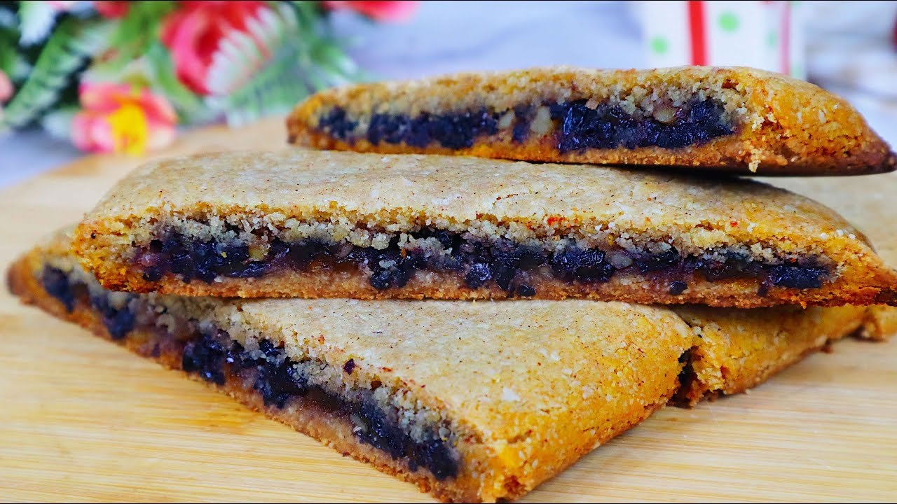 Almond Flour Raisin Walnut Filled Cookies — Tender spiced almond-flour cookies wrapped around a dark raisin and walnut filli