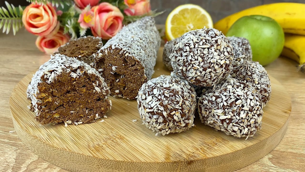 No-Bake Cashew Date Chocolate Energy Balls — Soft cashew-date balls bound by melted dark chocolate and brightened with lemon 