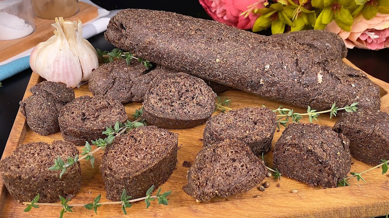 Flaxseed Psyllium Dark Baton Bread (Vegan) — Crusty dark bread made from ground flaxseed and psyllium, shaped into three bato