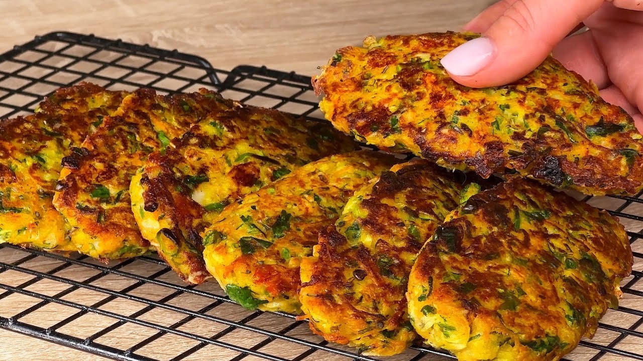 Zucchini Oat Mozzarella Fritters with Dried Tomato — Crisp pan-fried fritters of grated zucchini, carrot and potato with melted mozza